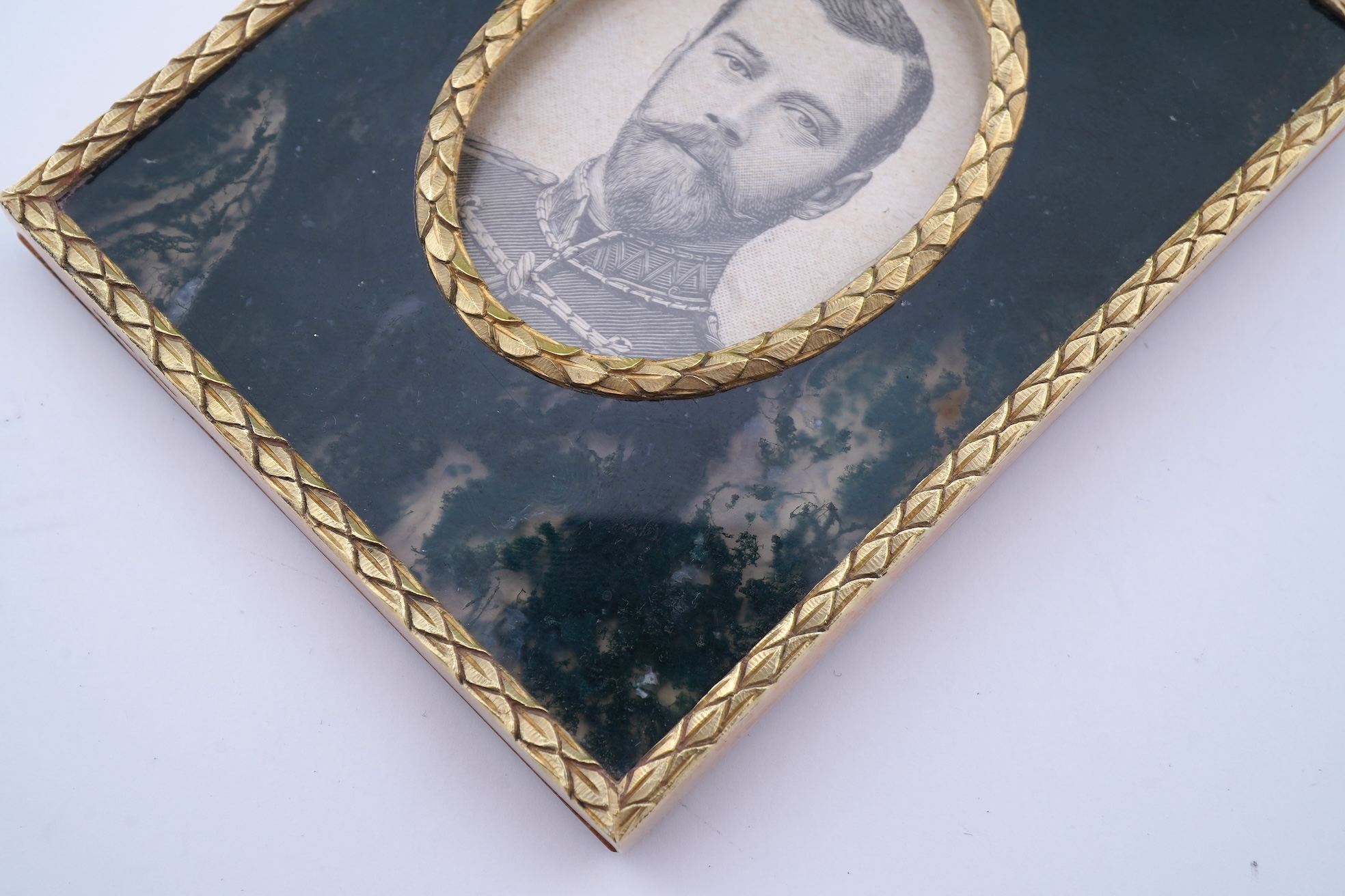 A gold and moss agate photo frame, 20th century